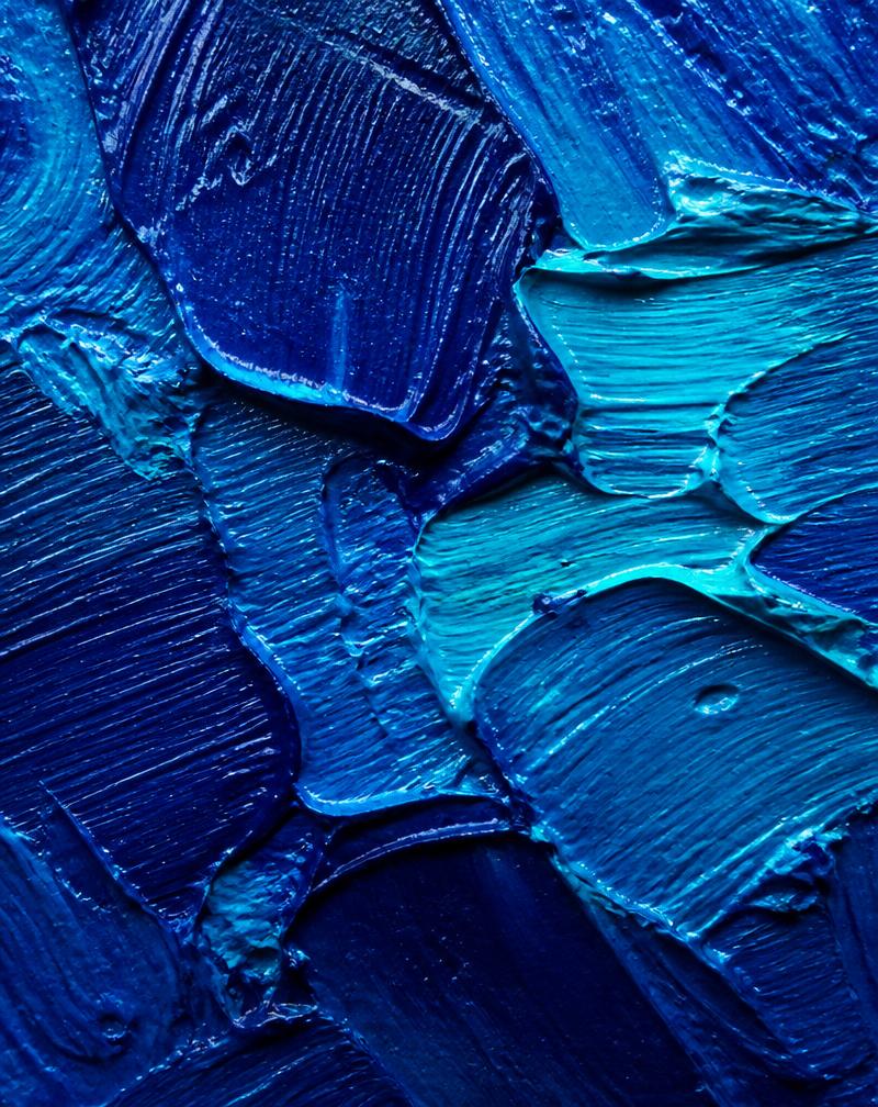 Macro detail of deep blue impasto brushstrokes